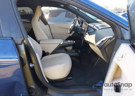 2024 BMW Ix xDrive50 z USA, uszkodzony, nr VIN WB523CF04RCN47854